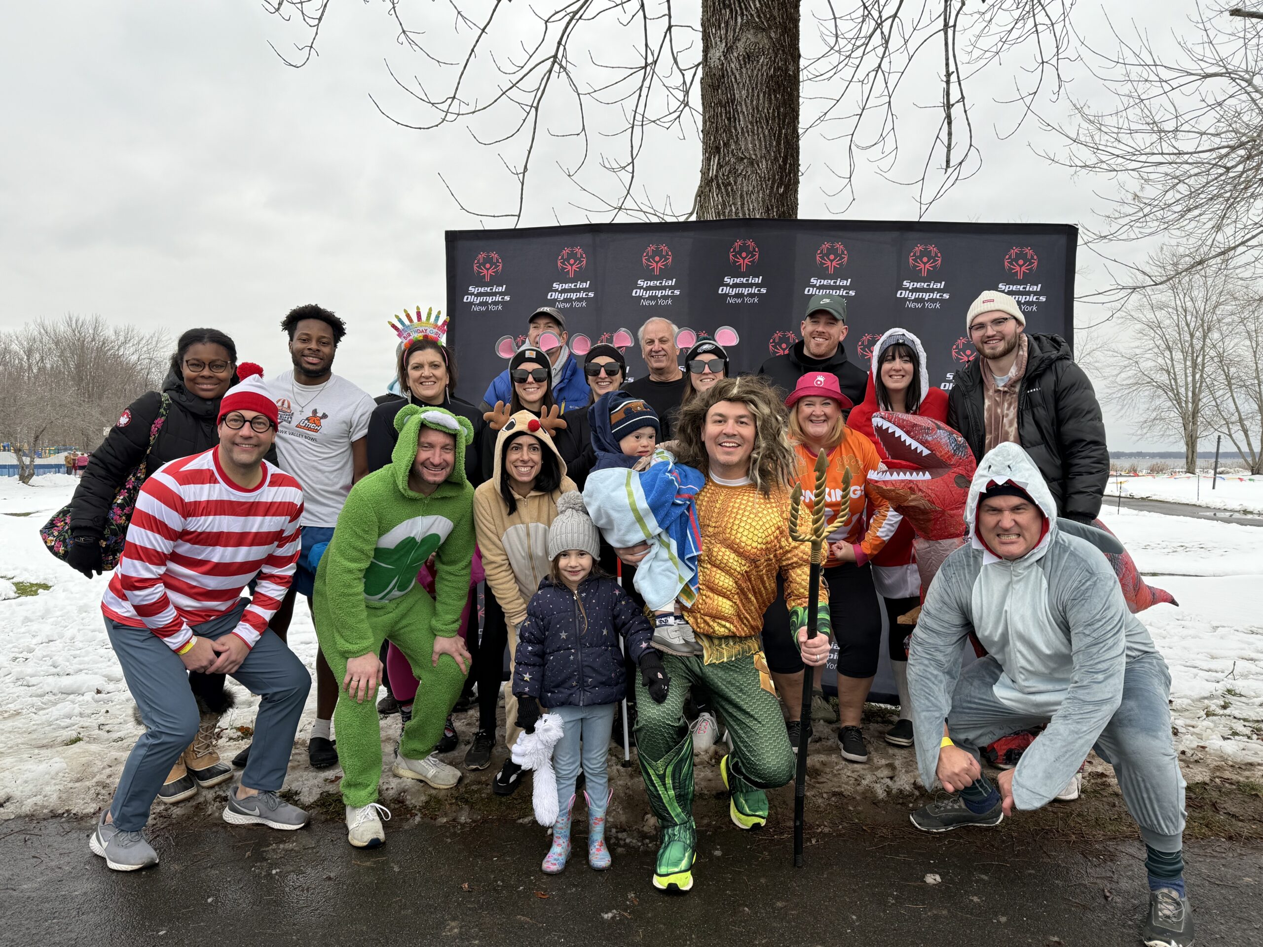 a plunge team poses with their costumes