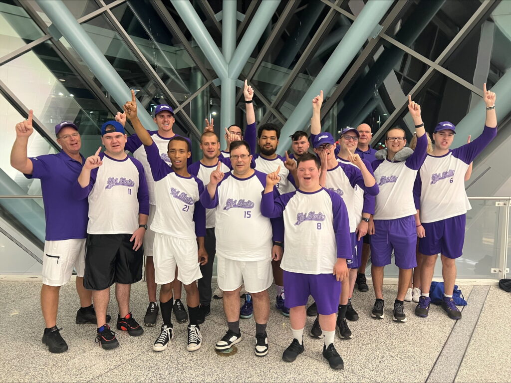 The whole team poses for a victory photo.