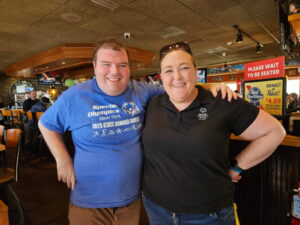 Amber Mott with an athlete